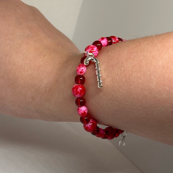 Handmade Silver Wire Bracelet with Red Splatter Beads and a Candy Cane Charm - Picture 2 of 2